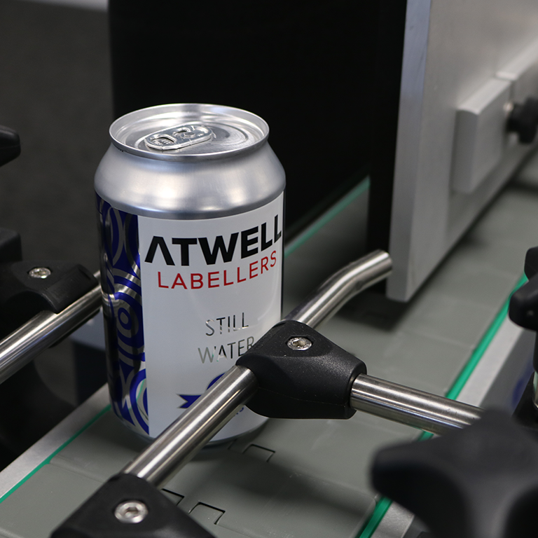 Drink Label on Can applied by Atwell Linear Wrap Machine